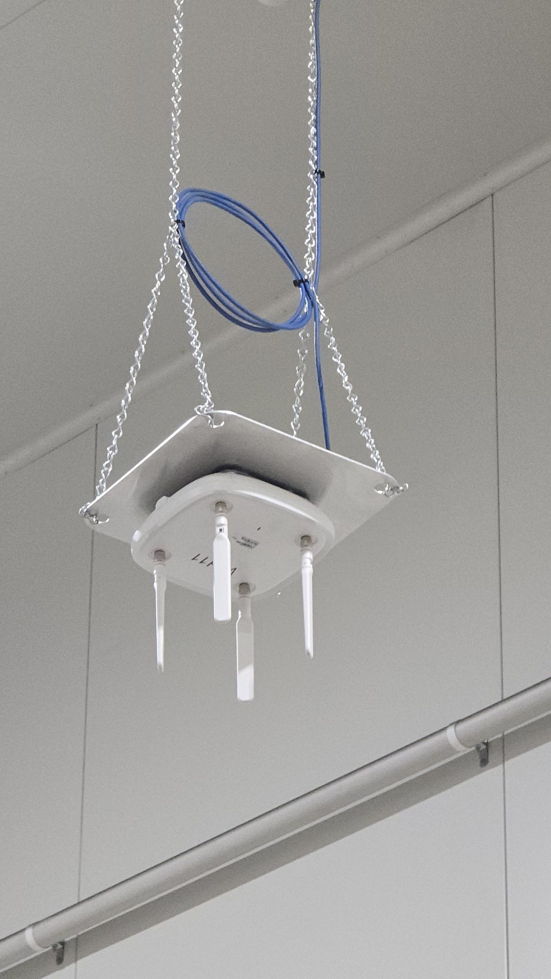 Wi-Fi access point installed in warehouse ceiling