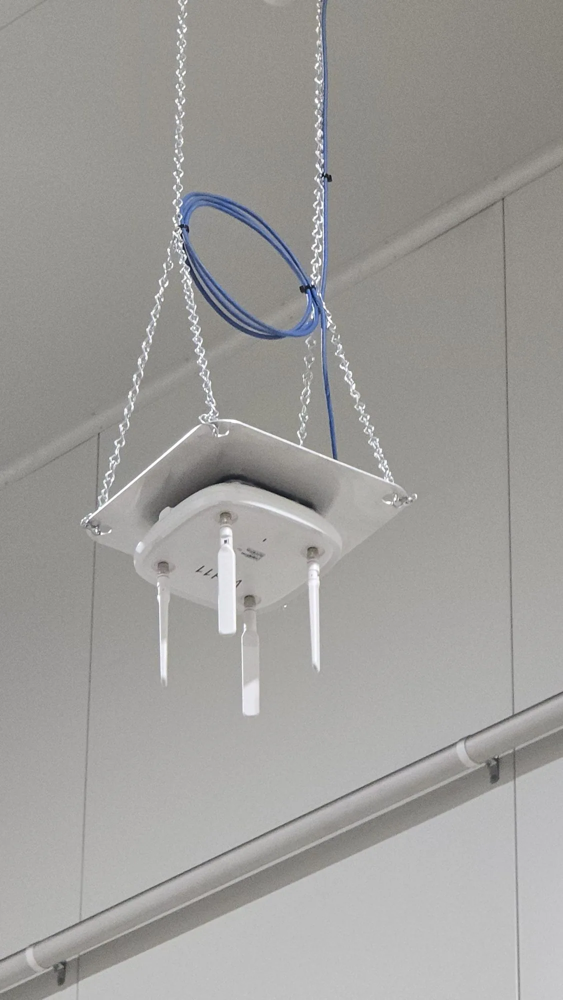 Wi-Fi access point installed in warehouse ceiling