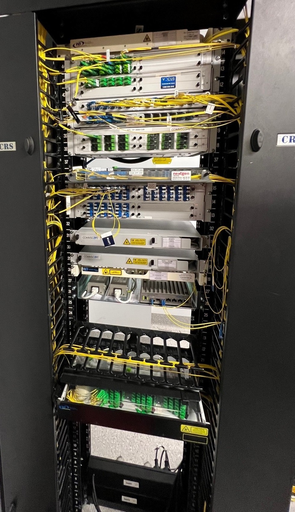 Cabinet B1 — Sydney data centre, high-density MTP/MPO fibre patching, OS2 yellow fibre